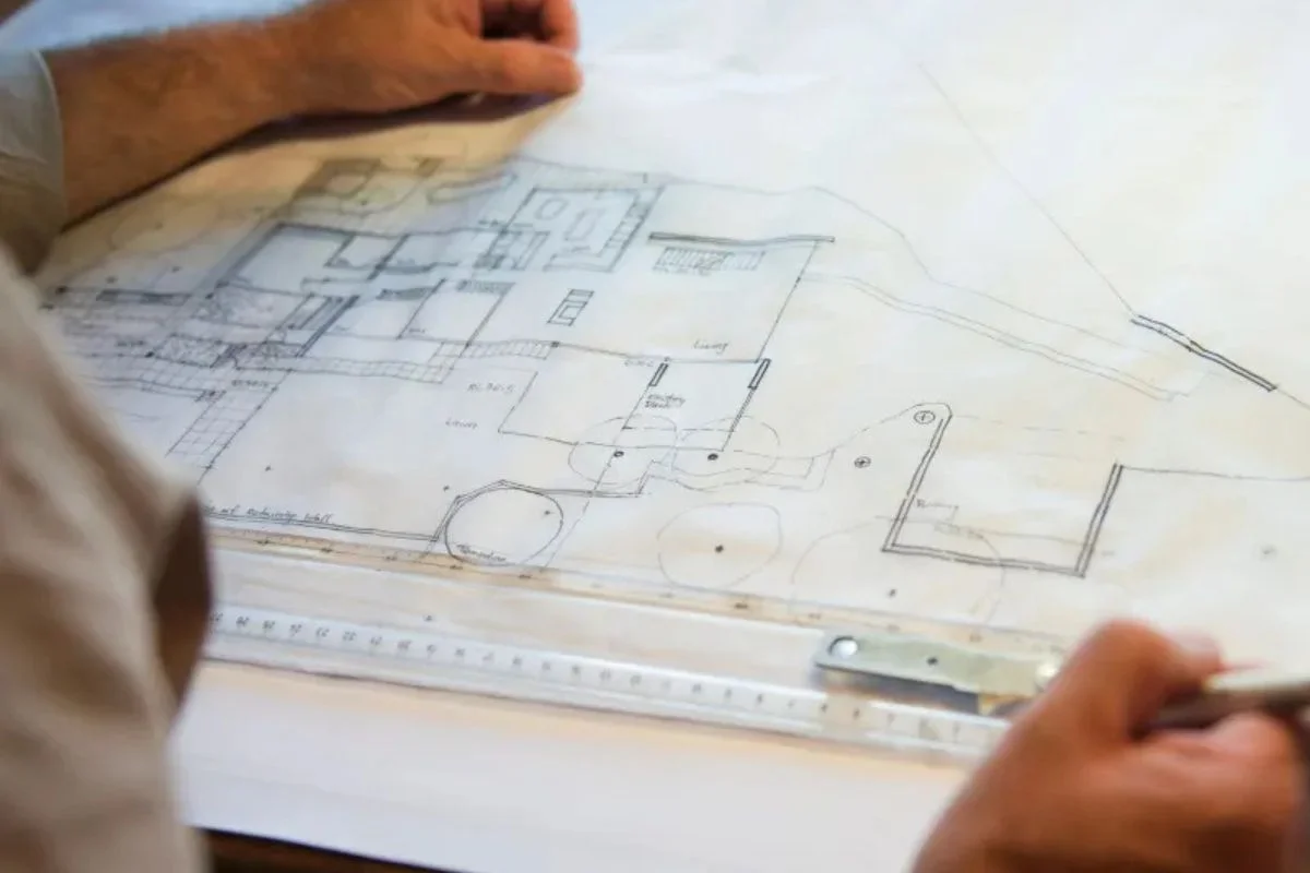 architect creating layout plan