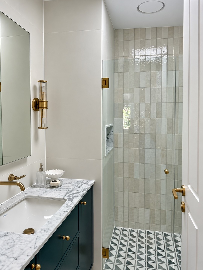 Ensuite with vanity, marble benchtop and brass tapware in a renovated Paddington terrace house