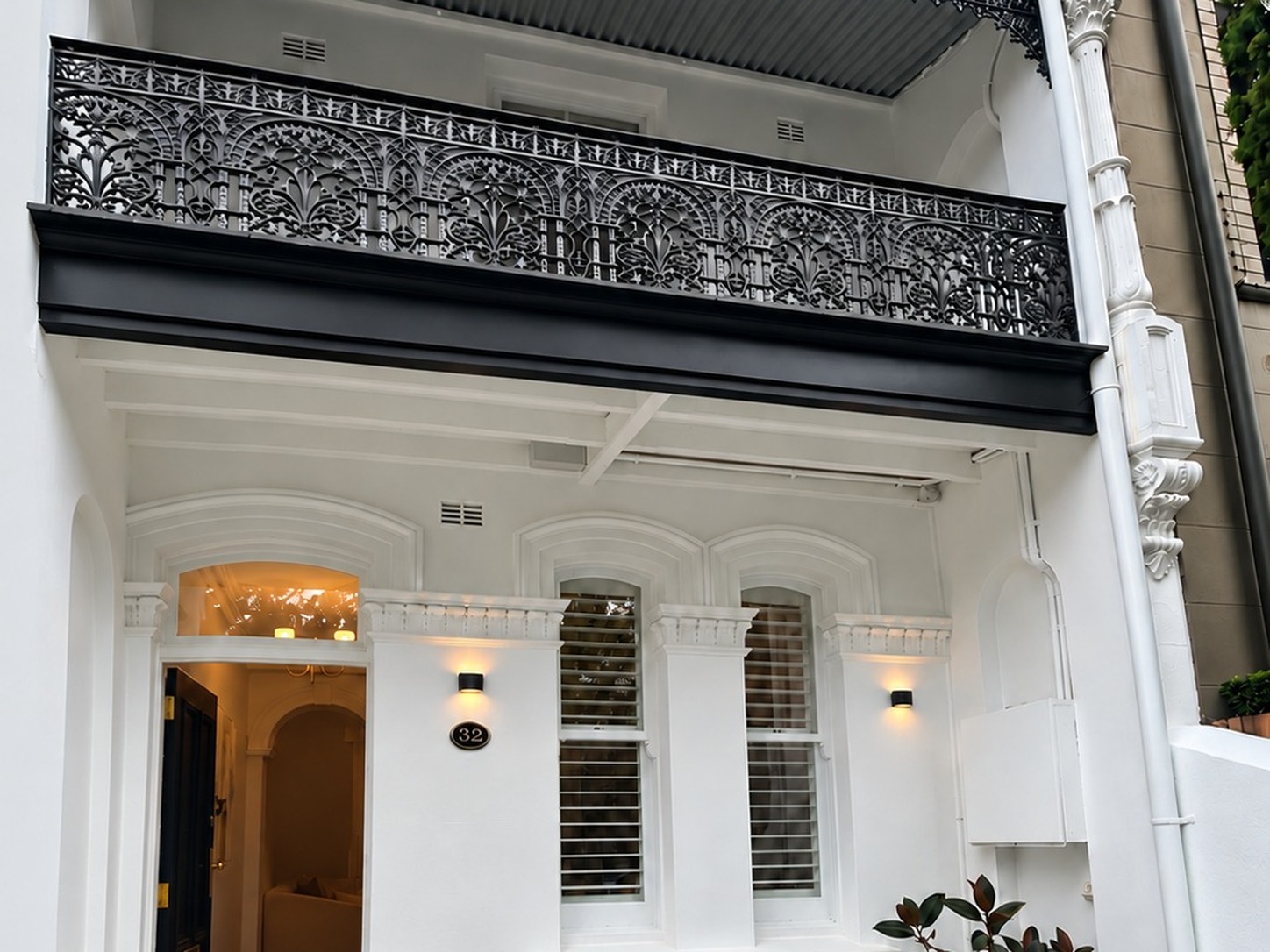 Heritage façade and cast-iron balcony of a Paddington terrace after a terrace renovation in Sydney